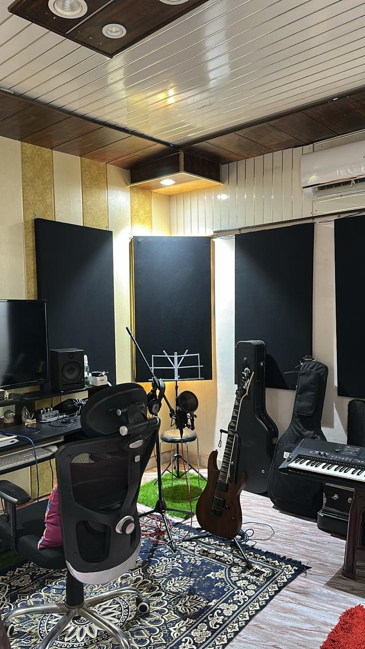 Sagar Music Academy recording studio with acoustic panels, guitars and keyboard