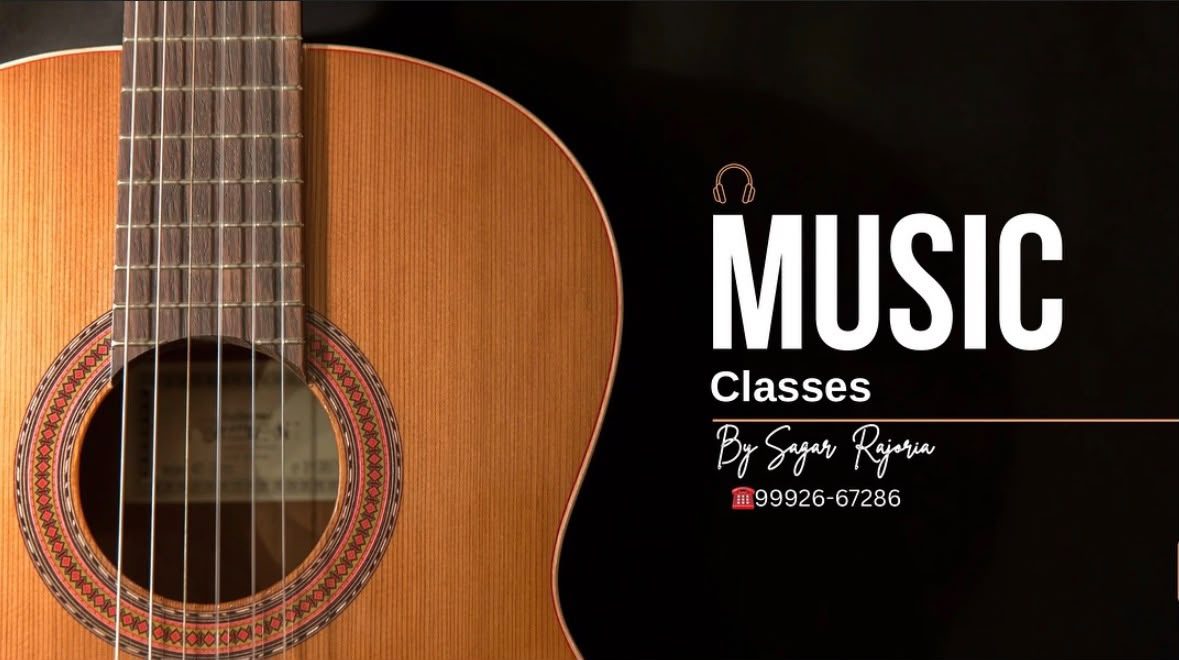 Instructor performing live with an acoustic guitar